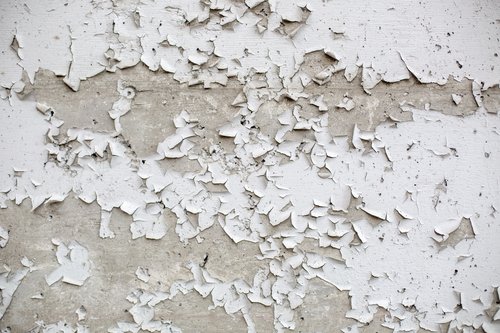 Peeling white paint.