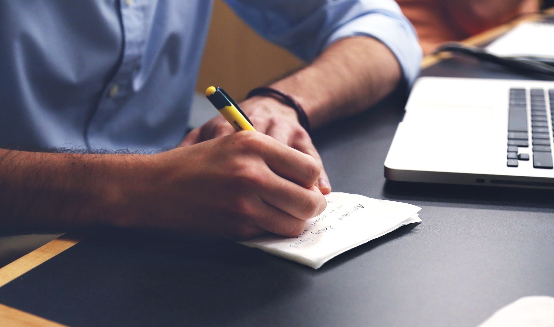 Filling out forms on a desk.